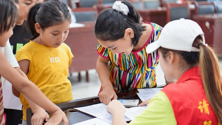 知行中華 | 《中國民族報》教育版刊文報道學校“語潤邊疆”推普實踐團隊